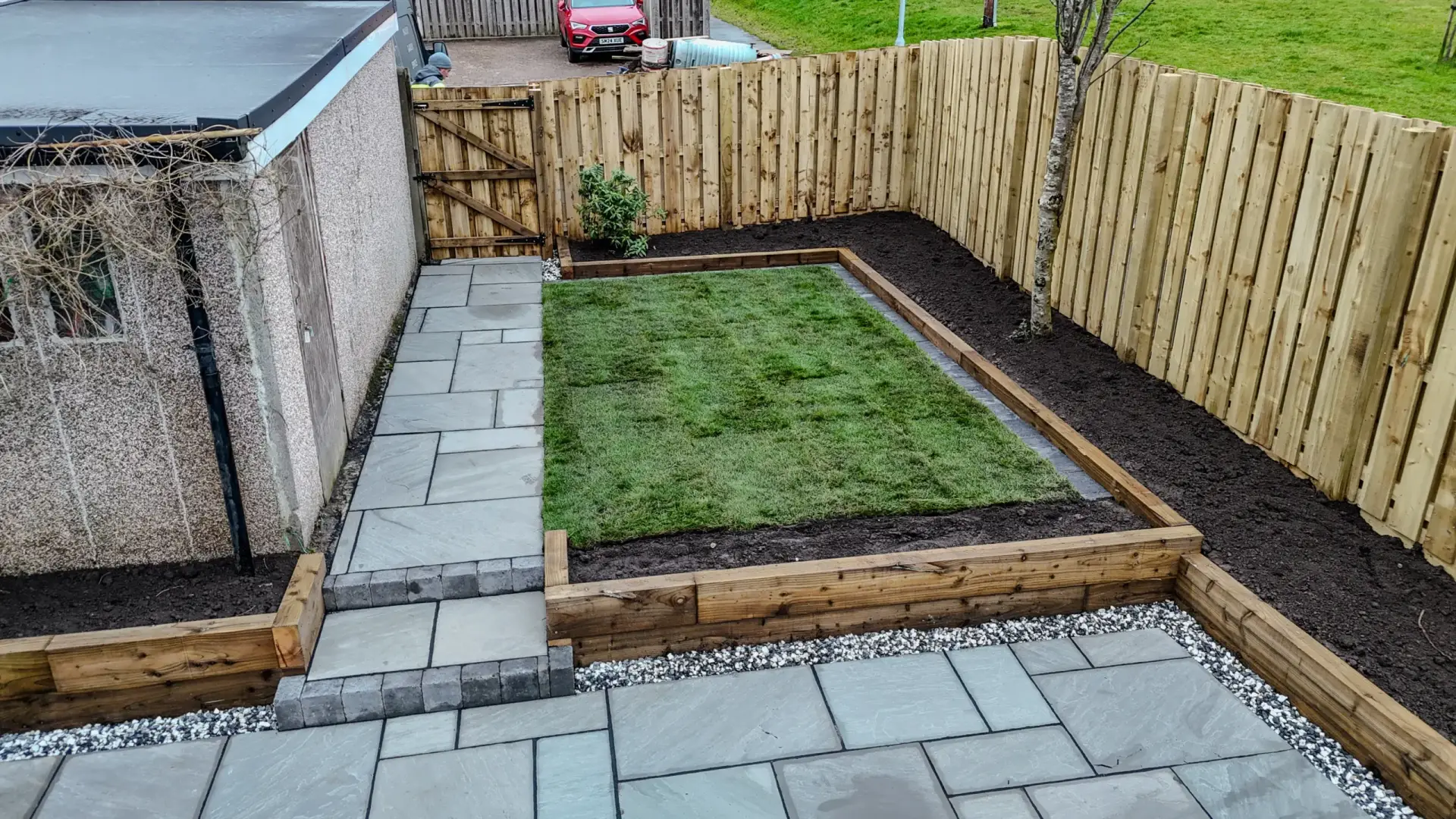 Landscaped garden and fence in midlothian