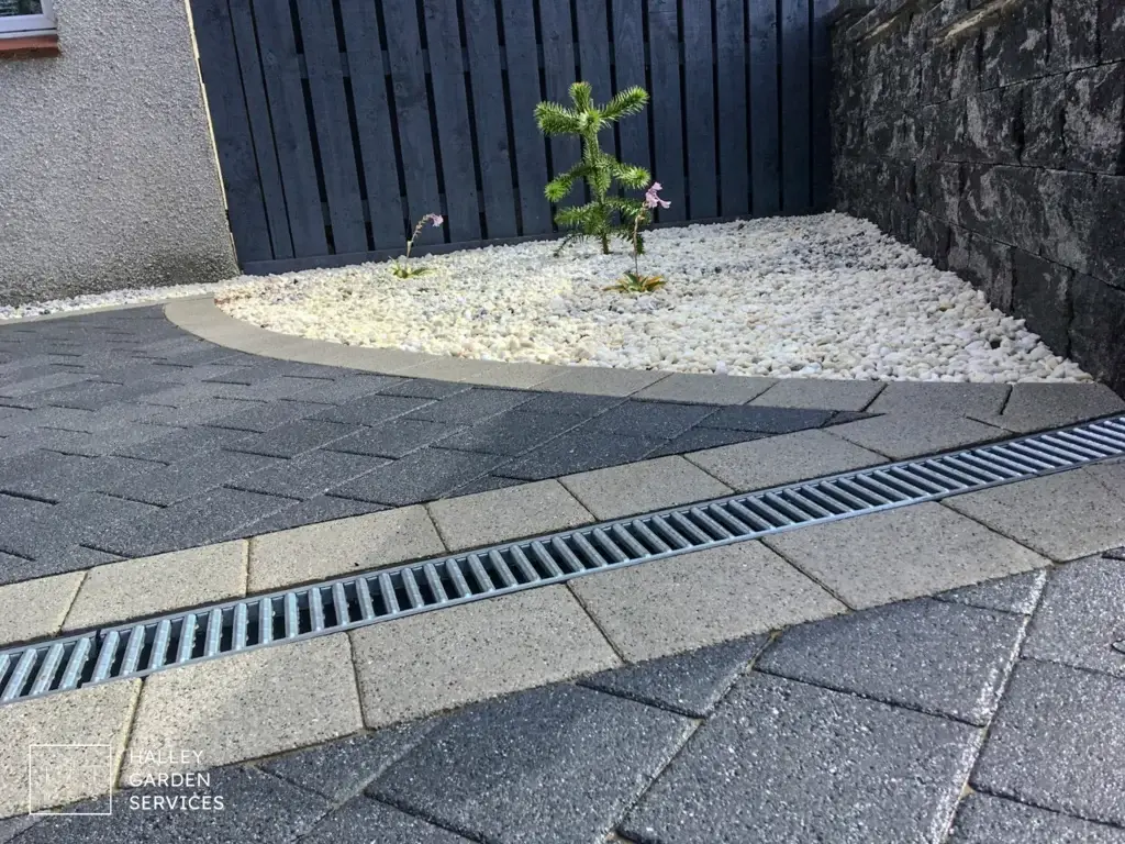 Linear drainage channel installed in a block paving driveway in Midlothian