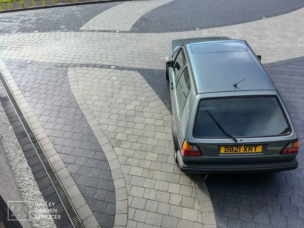 Monoblock driveway with contrasting block paving pattern installed by Halley Garden Services in Midlothian